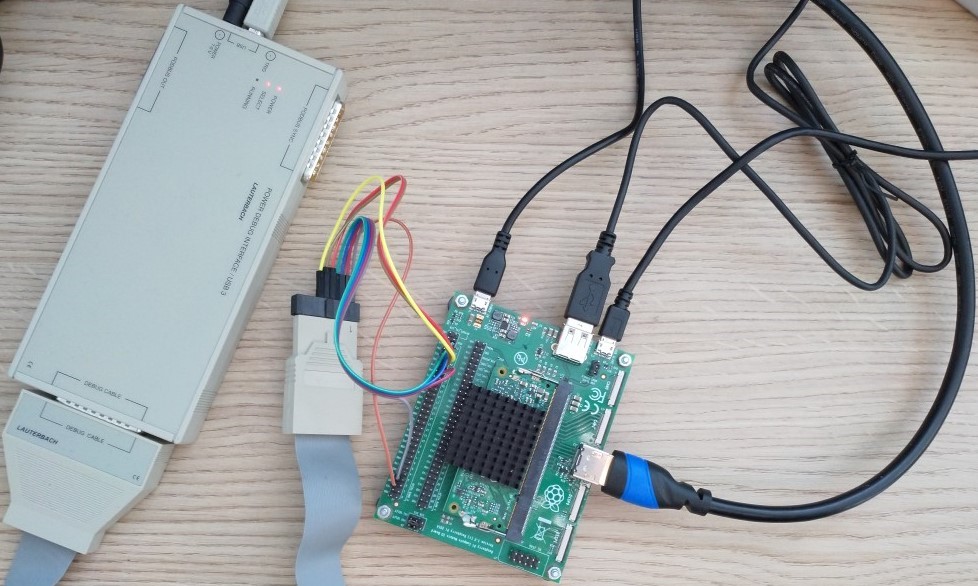 Picture: Still life of a Raspberry Pi Compute Module attached to a JTAG-Debugger. We plan to amend the boards of all Revolution Pi products with a JTAG header to be able to analyze freezes and other issues more easily going forward.